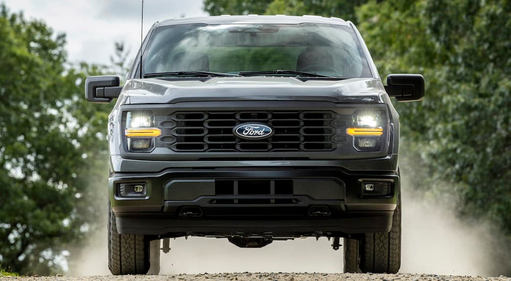 A black 2025 Ford F-150 from the front.