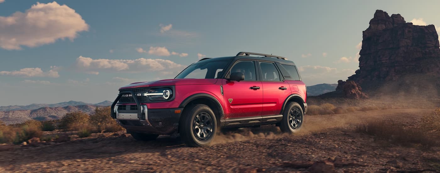 Red 2025 Ford Bronco Sport off-roading on dirt