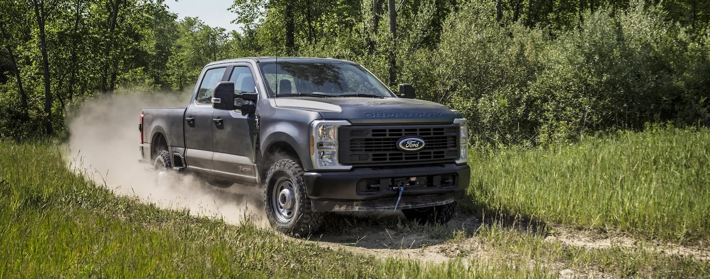 Grey 2026 Ford F-350 Super Duty parked off-road.
