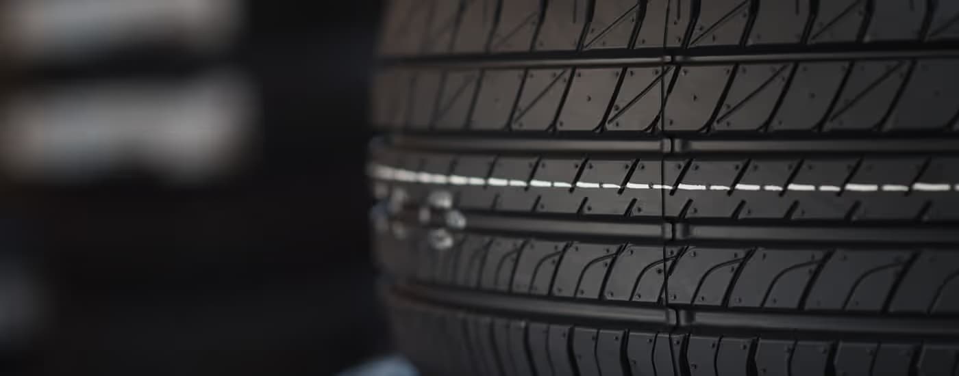 Close-up on the treads on a tire.